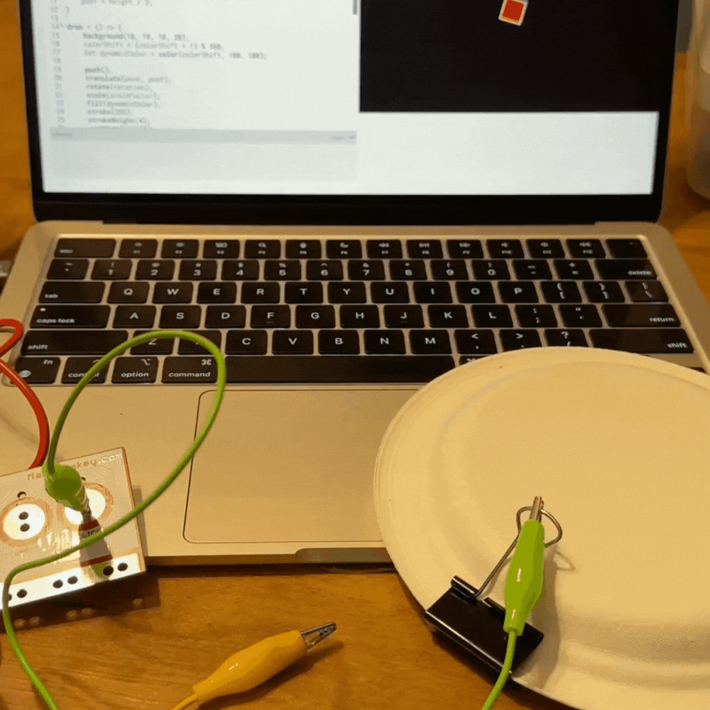 paperclip and paper plate with copper tape