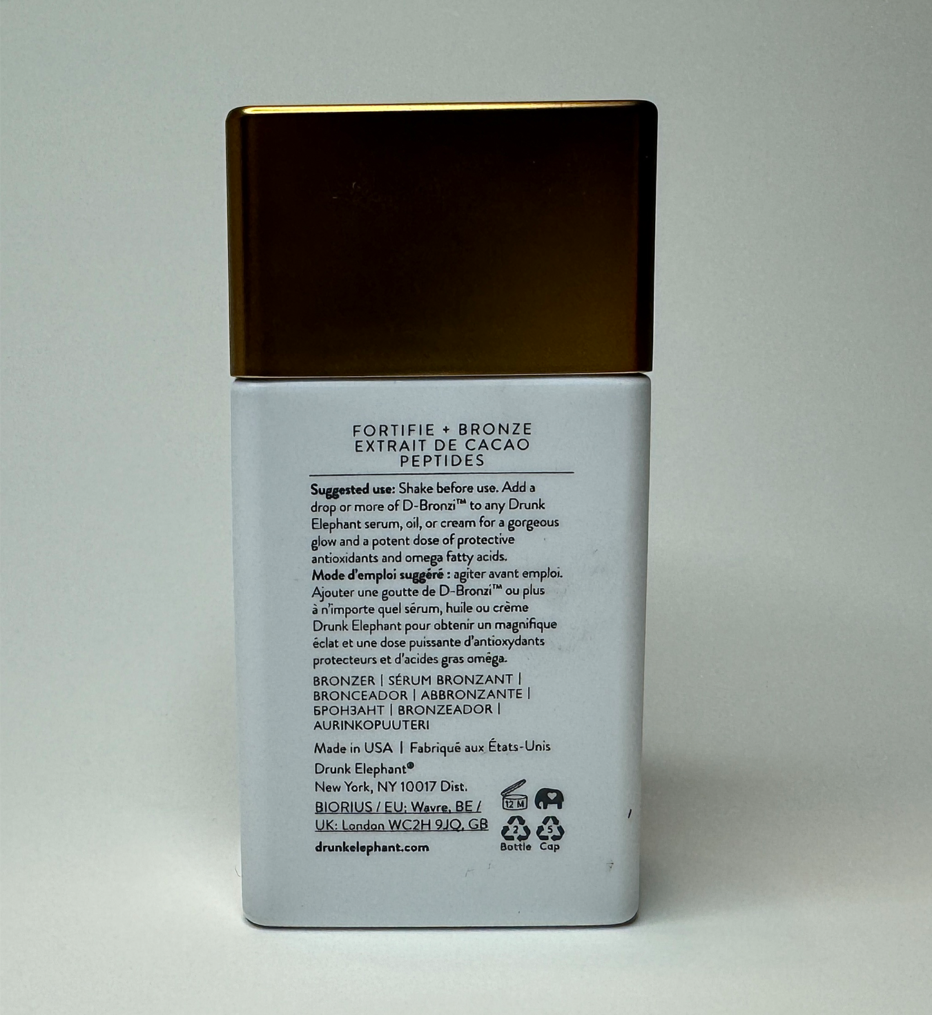 Image of the back of Drunk Elephant bronzing drops